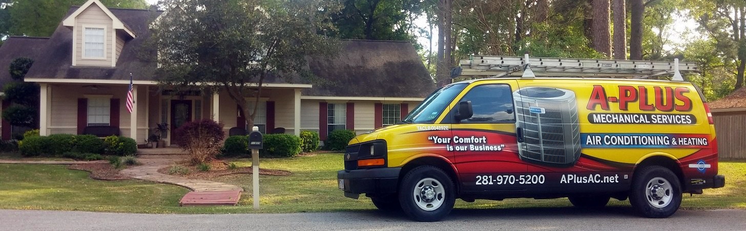 A-Plus Mechanical work van in front of a house.