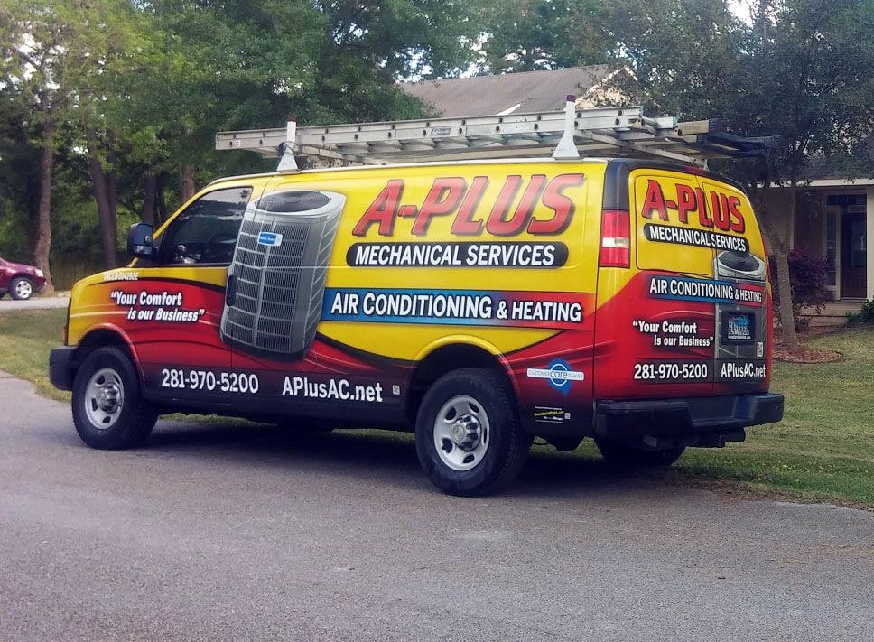 A-Plus Mechanical work van parked on the street.